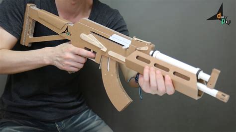 how do you make a cardboard gun|how to make a cardboard gun that shoots easy.